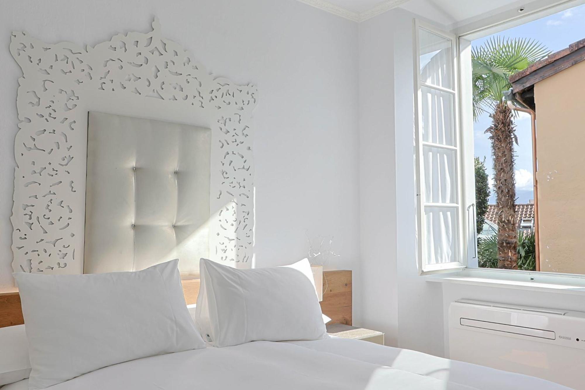 Caffe Dell'Arte Boutique Rooms Локарно Экстерьер фото